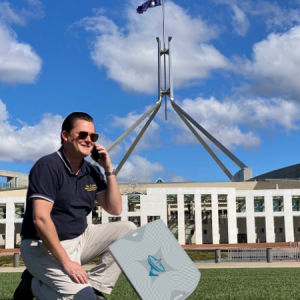 Satcube portable satellite dish outside Australia Parliament House